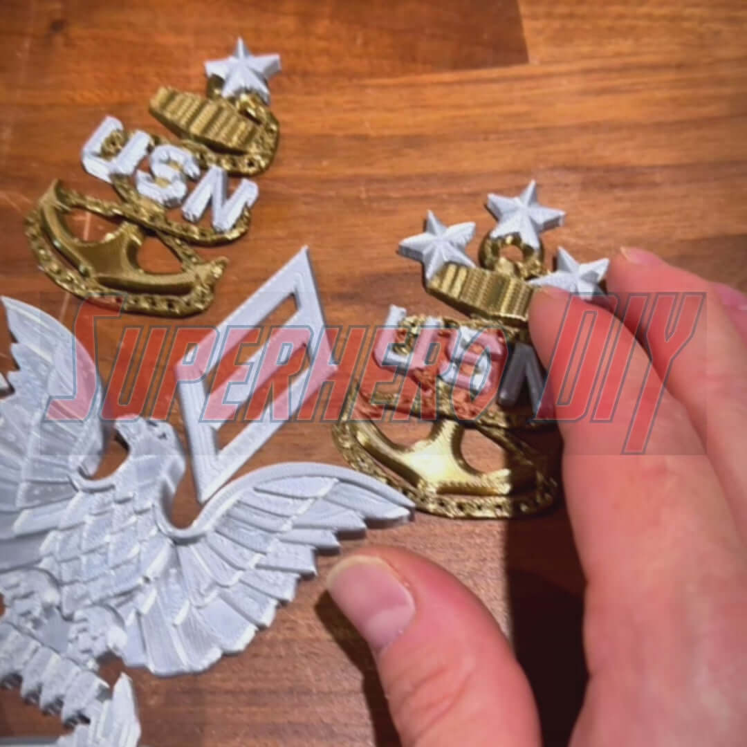 Navy Enlisted Rate Insignia | Multiple Sizes Display Insignia Silver and Gold showcased on a wooden surface.