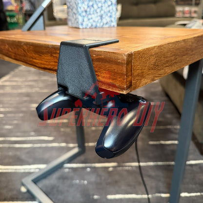 Under-desk PS5 controller mount displaying controller stored safely underneath a wooden table.
