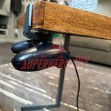 Under-desk PS5 controller mount holding a PS5 controller securely beneath a wooden desk.