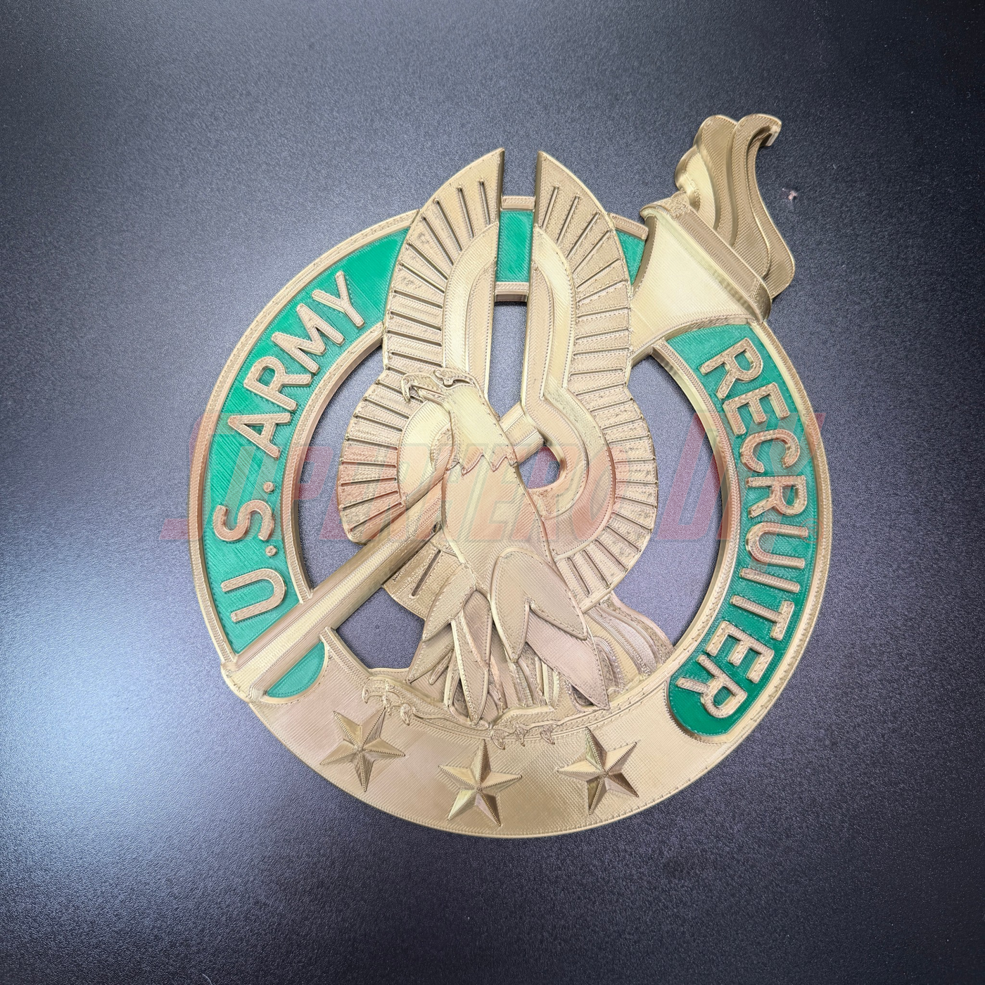 Army Recruiter Badge insignia in gold with U.S. Army and Recruiter lettering, ideal for display.