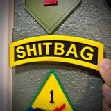 SHITBAG tab in classic arched style, black and yellow, perfect gag gift for soldiers.