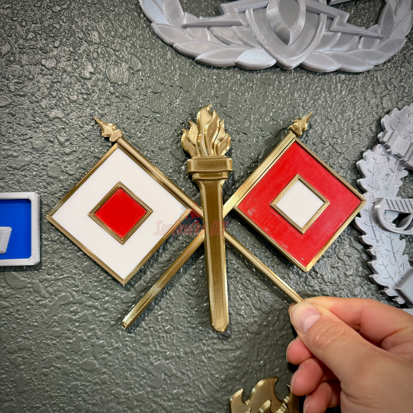 Signal Corps insignia featuring crossed flags and torch, perfect for wall display or shadow box.