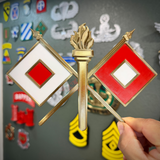 Signal Corps insignia featuring crossed signal flags and a flame, perfect for display or shadow box.