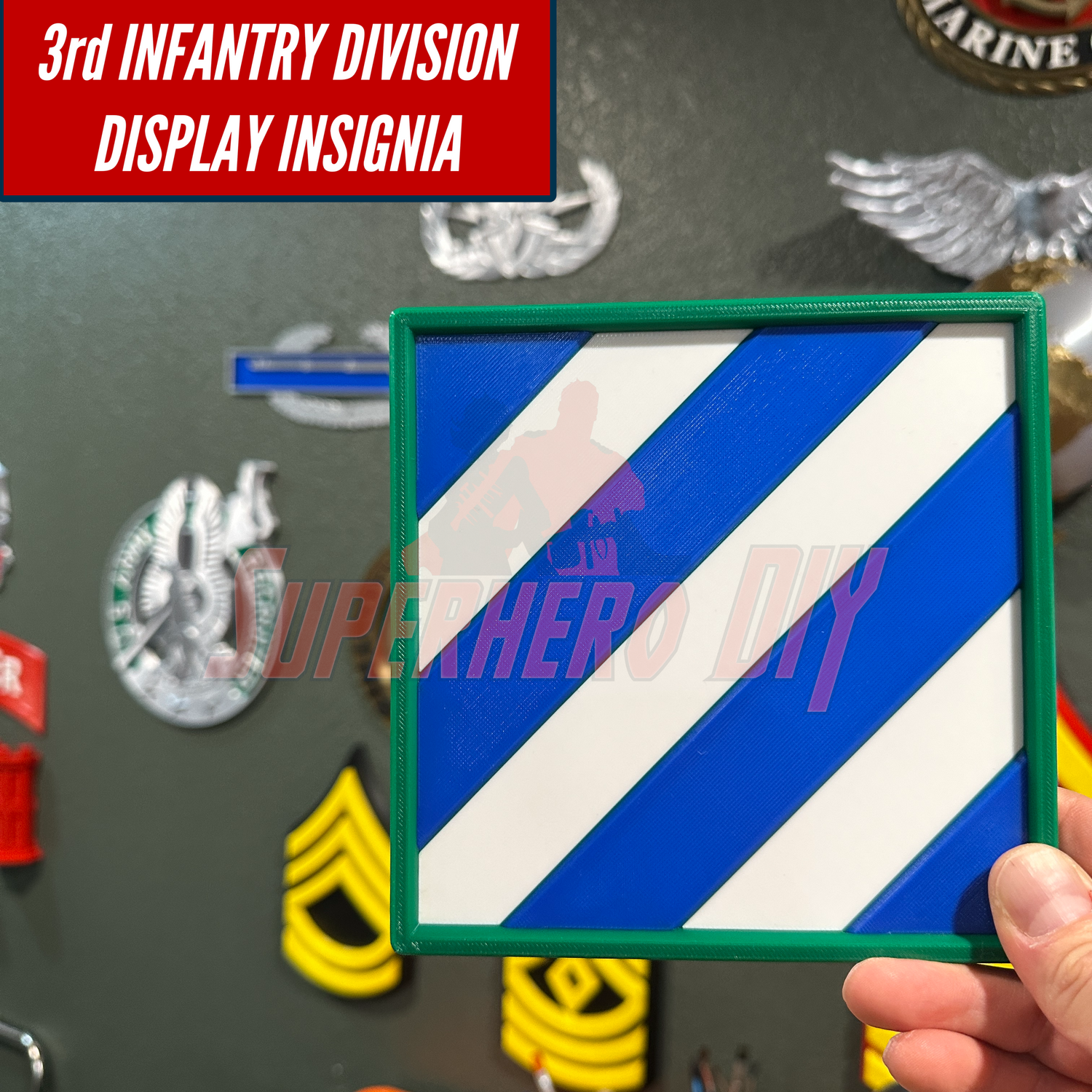 3rd Infantry Division display insignia in blue and white, 3D-printed, held against a wall of military patches.