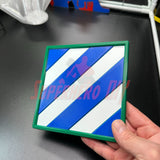 Hand holding a 3rd Infantry Division display insignia with blue and white stripes, ready for display, multiple sizes available.