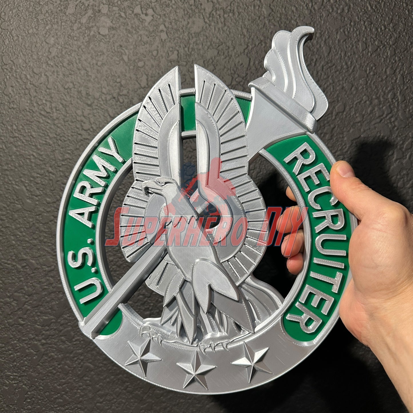 Army recruiter badge insignia wall display with detailed eagle, torch, and stars design in multiple sizes for service displays.