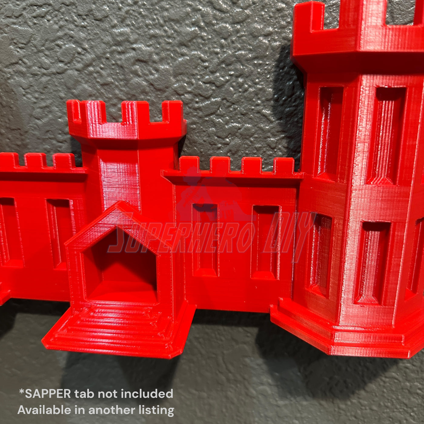 Wall-mountable Army Engineer Castle display in red for memorabilia showcase.