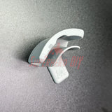 Hat display wall mount shown on a grey surface for organizing and displaying hat collection with ease.
