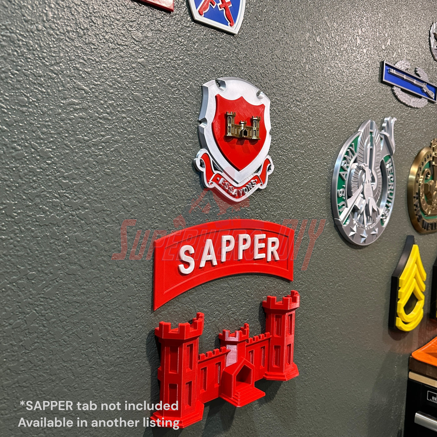 Wall-mounted Army Engineer Castle display with SAPper tab, honoring U.S. Army Corps of Engineers. Perfect for military memorabilia.