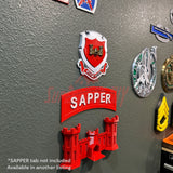Wall-mounted Army Engineer Castle display with SAPper tab, honoring U.S. Army Corps of Engineers. Perfect for military memorabilia.