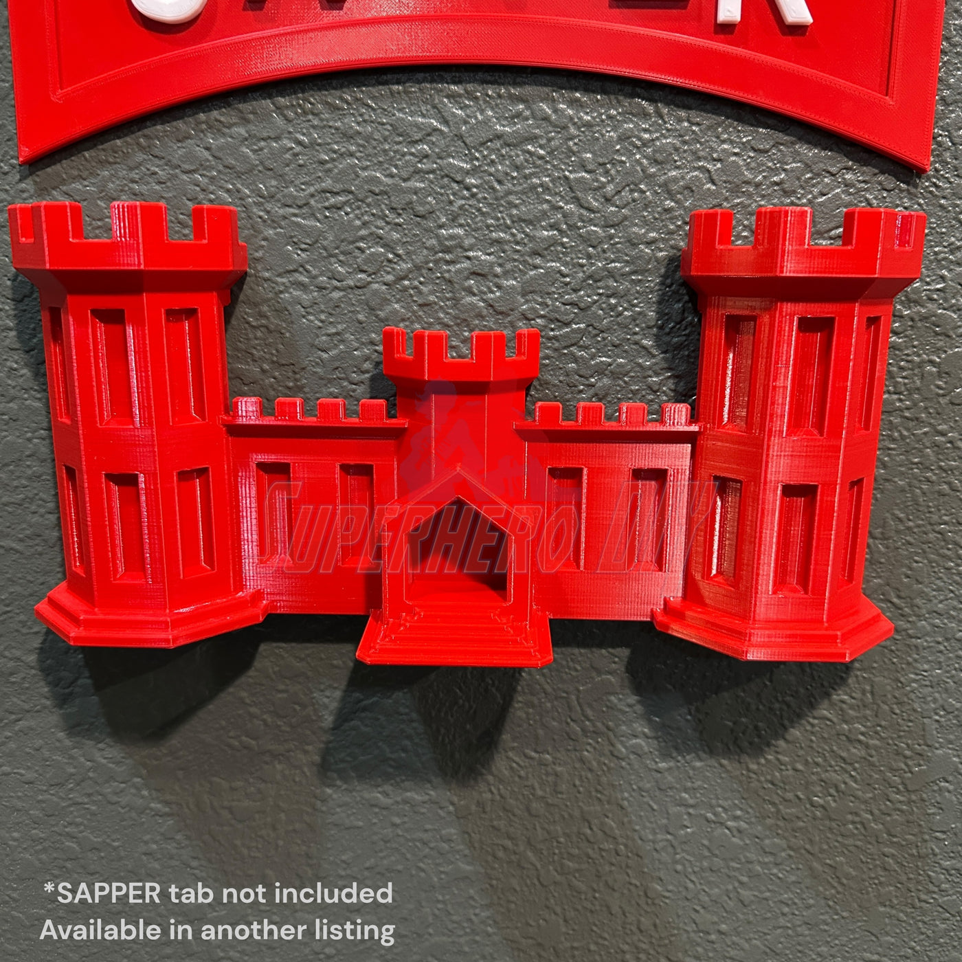 Wall-mountable Army Engineer Castle display piece in red, perfect for memorabilia walls.
