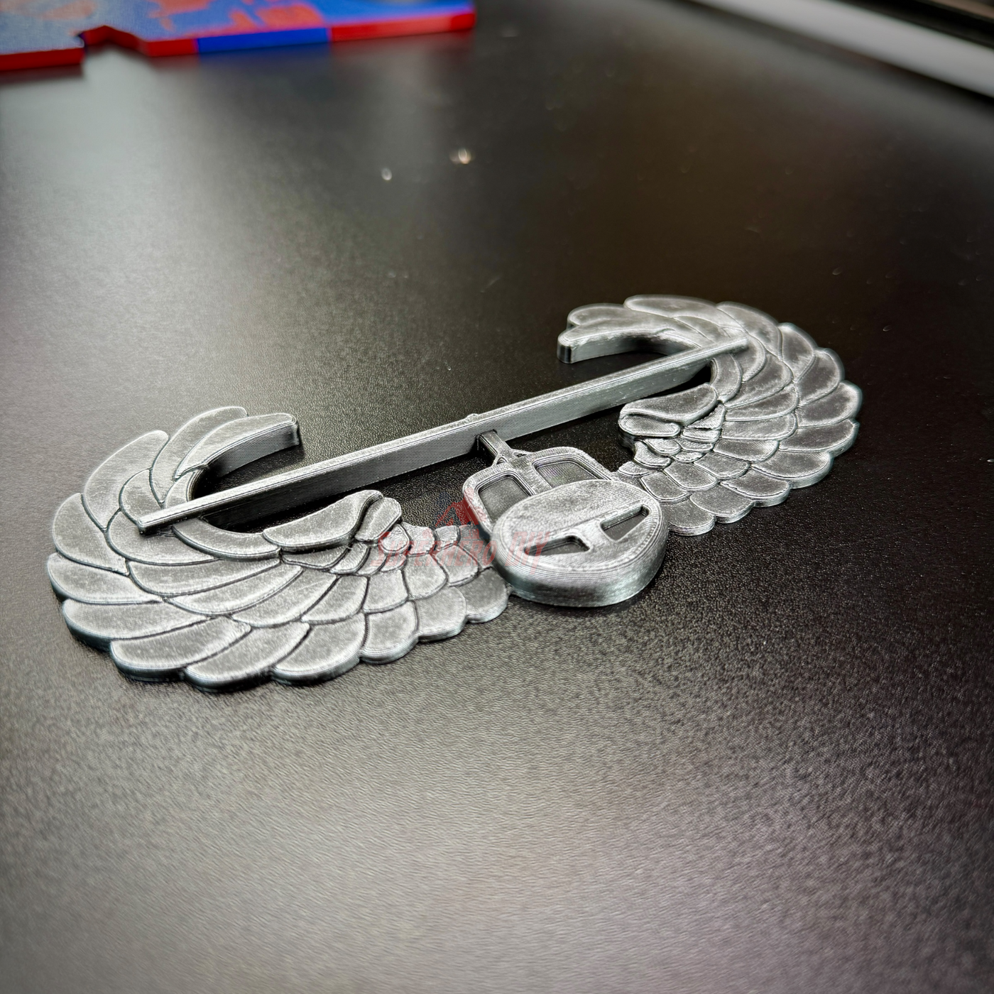 Subdued Air Assault Badge display insignia with wings, custom hand-painted, suitable for military wall mount or shadow box.