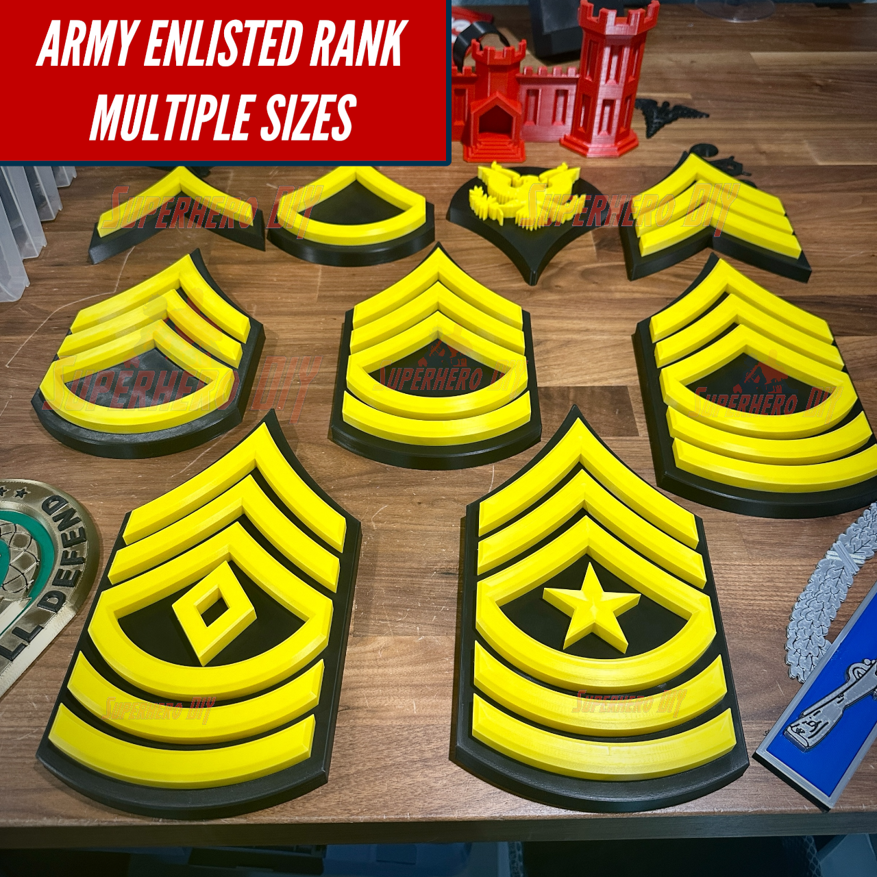Army enlisted rank insignia displayed in multiple sizes on wooden background, showcasing various ranks with a bold design.