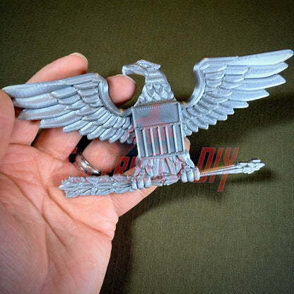 Colonel Captain rank insignia O-6 in hand, detailed replica for collectors and cosplayers, multiple sizes available.