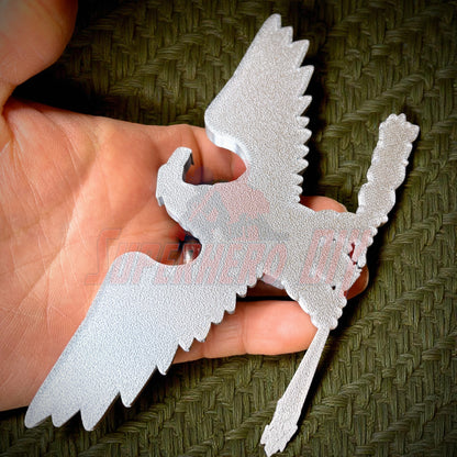 Hand holding Colonel Captain rank insignia O-6 replica with intricate details, suitable for collectors or cosplayers.