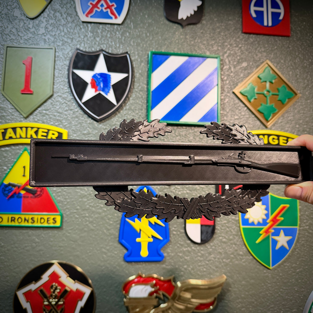 Combat Infantryman Badge display insignia with 1795 Springfield musket on oak wreath.