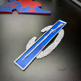 Combat Infantryman Badge (CIB) replica displayed on a dark surface, showcasing intricate 3D-printed design.