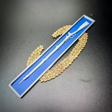 Master Combat Infantryman Badge (EIB) replica displayed on a blue background with a decorative border.