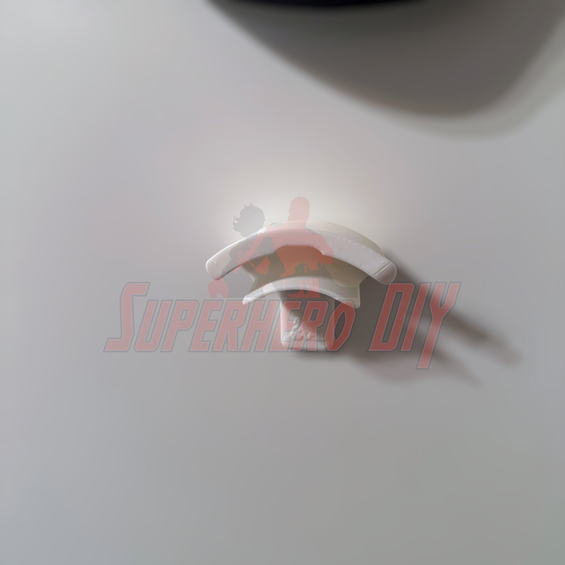 Wall-mounted hat display hook for organizing caps, perfect for easy installation without damage. Hat display wall mount.