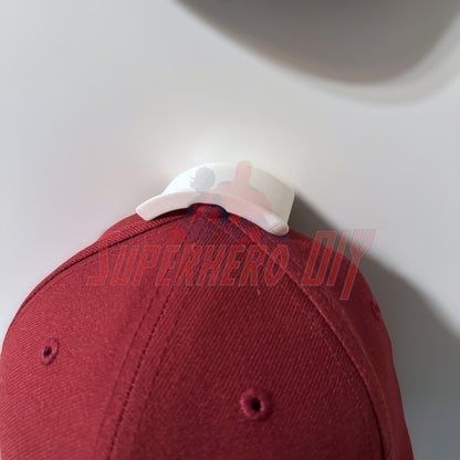 Hat display wall mount showing a cap organized and held securely.