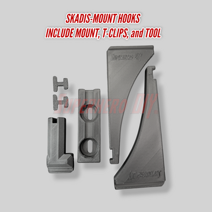 Skadis-mount hooks with mount, T-clips, and tool on a gray background