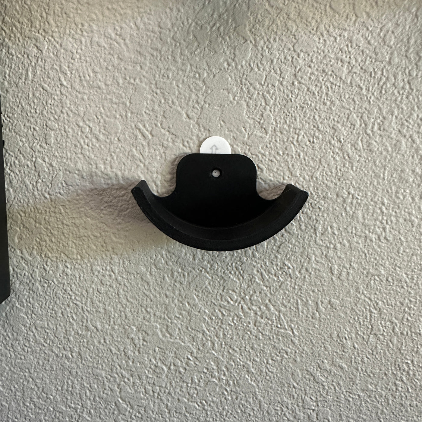 Hockey puck holder wall mount showcasing a 3D-printed design, ideal for displaying prized hockey pucks.