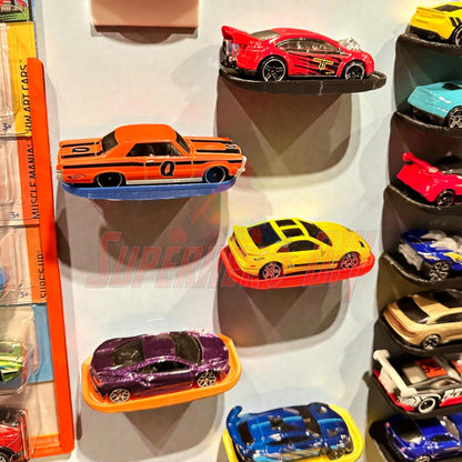 Display shelf for Hot Wheels featuring 1:64 scale diecast cars neatly arranged, showing the clutter-free floating design with command strip.