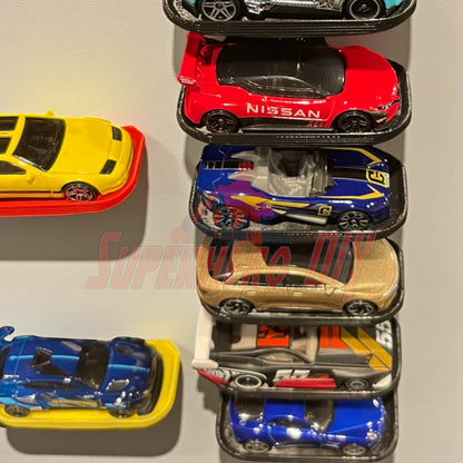 Display shelf for Hot Wheels showcasing 1:64 diecast cars with Command strip included.