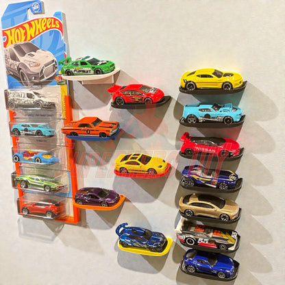 Display shelf for Hot Wheels with Command strip, featuring 1:64 diecast cars arranged neatly on a clean wall display.