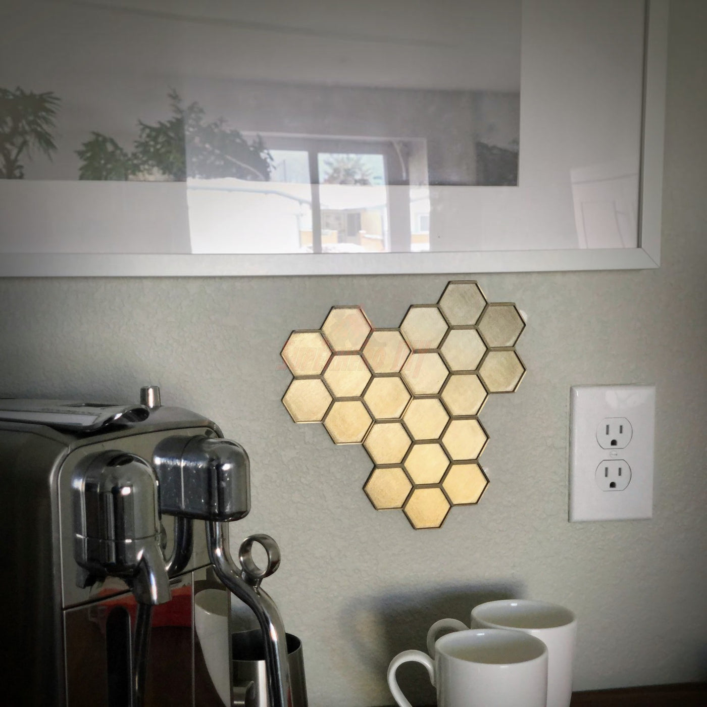 Honeycomb wall mount for original Nespresso coffee pod organizer, showcasing hexagonal design with coffee machine and cups.