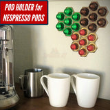Honeycomb wall mount pod holder for original nespresso coffee pod organizer with green and gold capsules.
