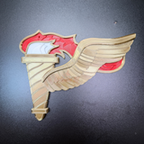 Army Pathfinder Badge display insignia with winged torch design in vibrant colors.