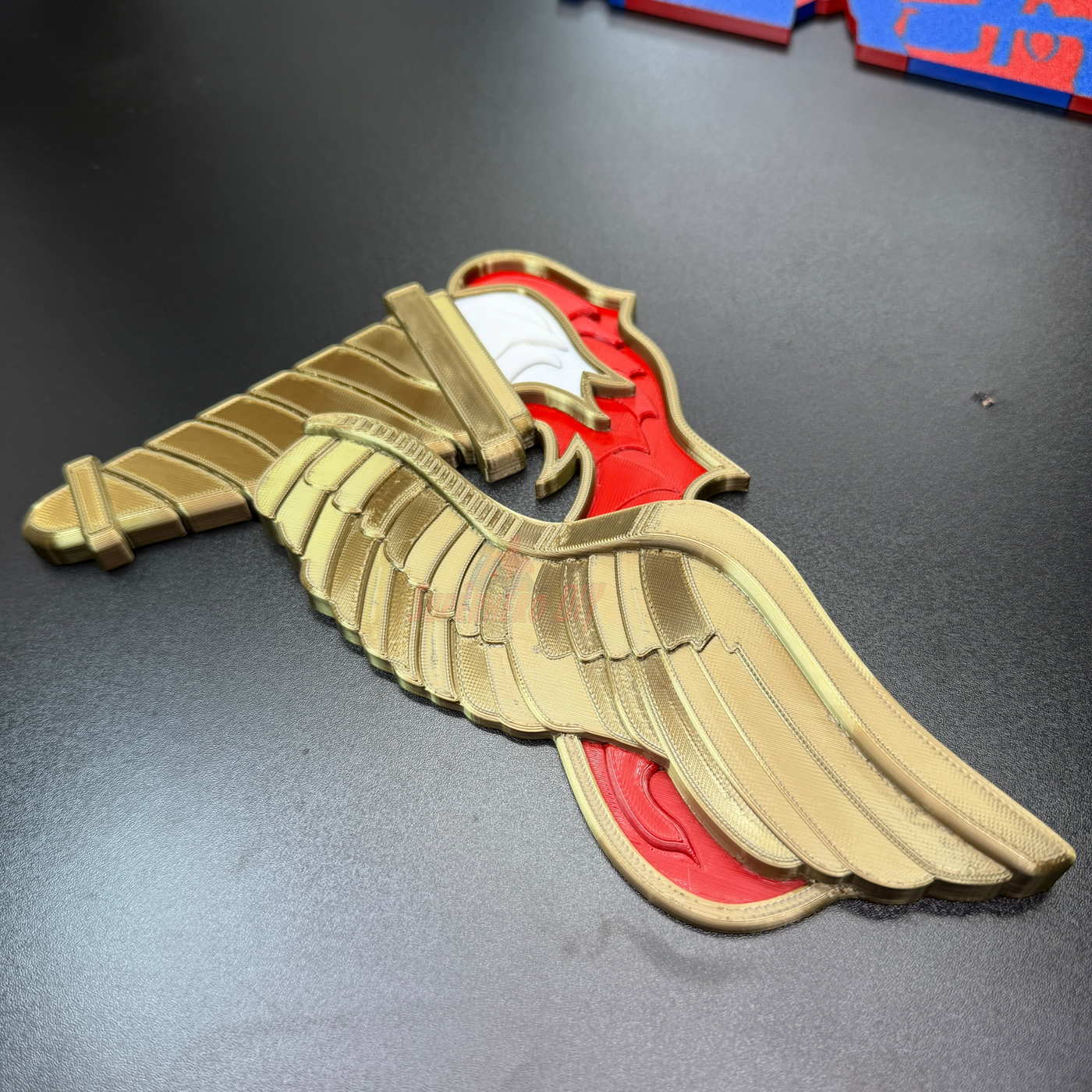 Army Pathfinder Badge in gold and red, showcasing winged design for wall display.