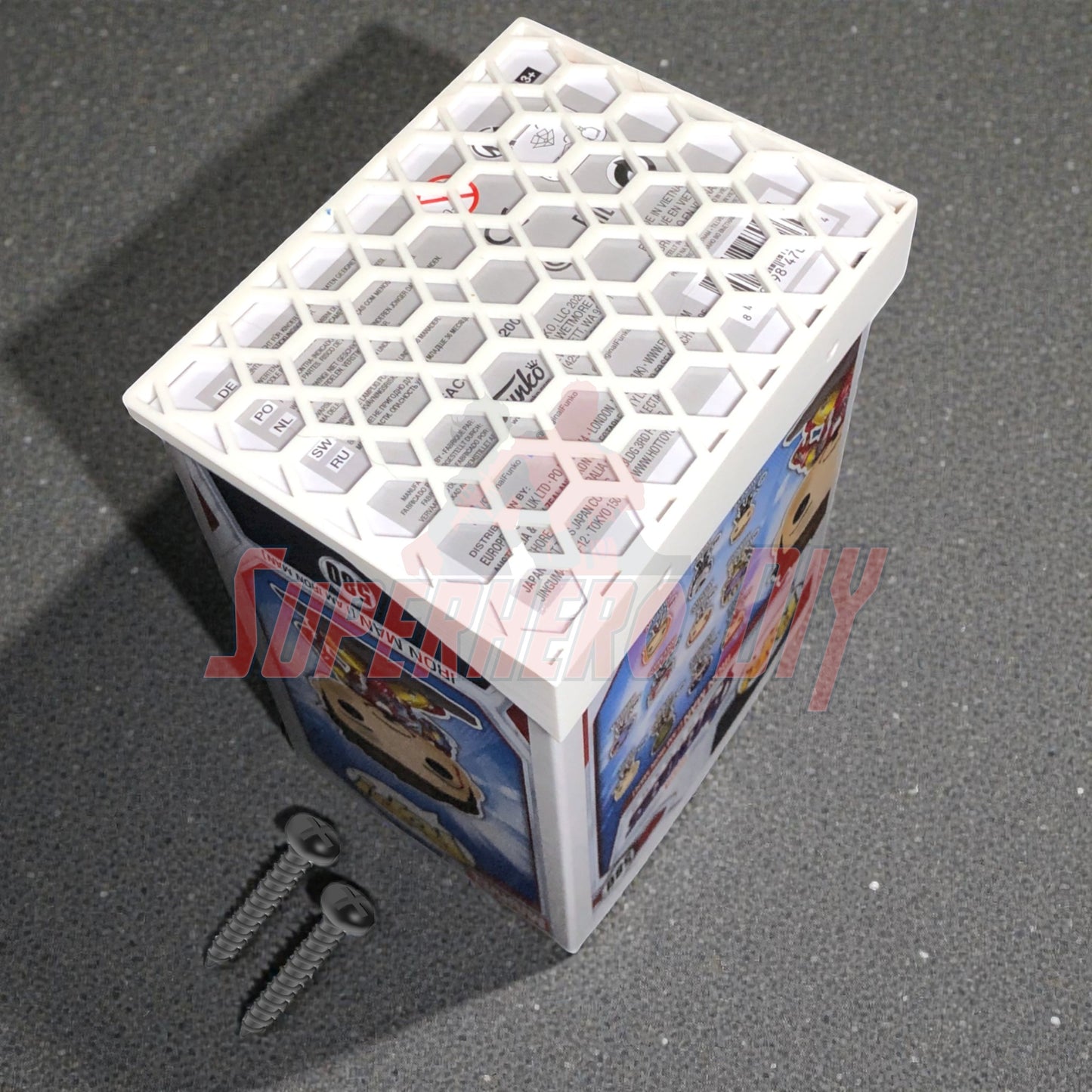 Hexagon Funko Pop display shelves with honeycomb design, showcasing box with screws on gray background