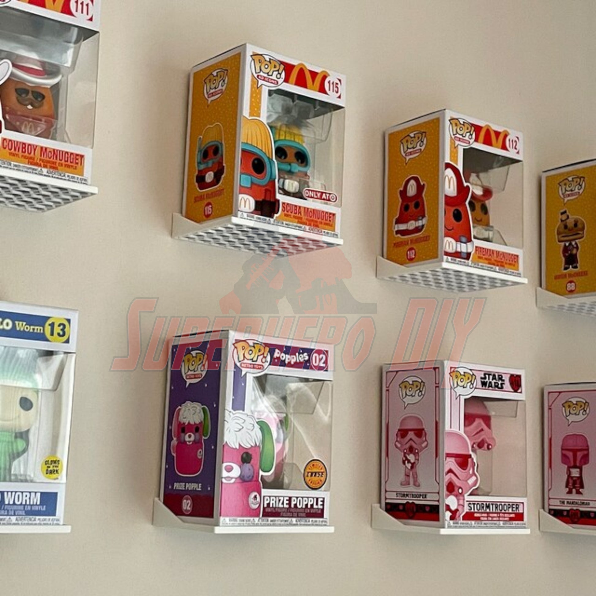 Hexagon Funko Pop display shelves mounted on wall with Funko Pop figures in soft and hard protector cases