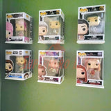 Hexagon Funko Pop display shelves showcasing six boxed collectibles on a green wall.