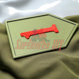 3D-printed 1st Infantry Division display insignia Big Red One patch on fabric surface