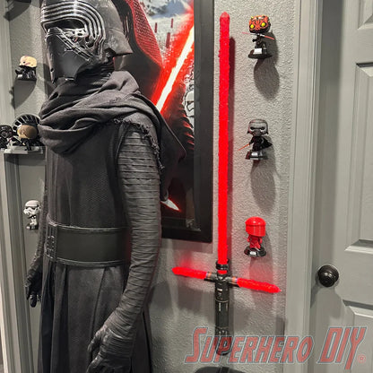 Check out the Vertical Wall Mount for Lightsabers from Superhero DIY! The perfect solution for only $10.99